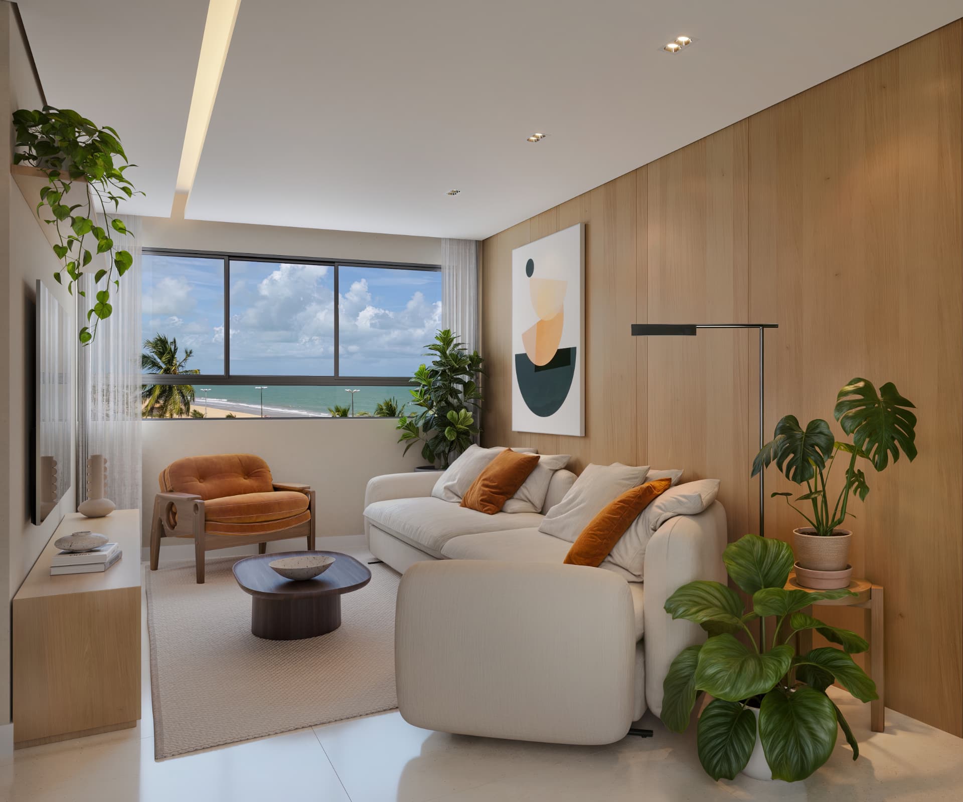 Sala de estar com sofá claro, poltrona laranja, painel de madeira e janela ampla com vista para a praia e o mar