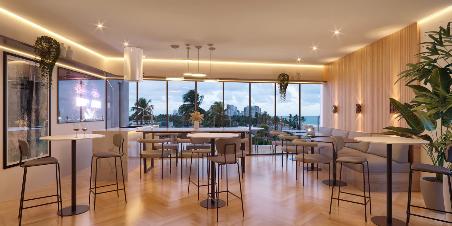 Sport bar com mesas altas, banquetas, bancada e grandes janelas com vista para o mar